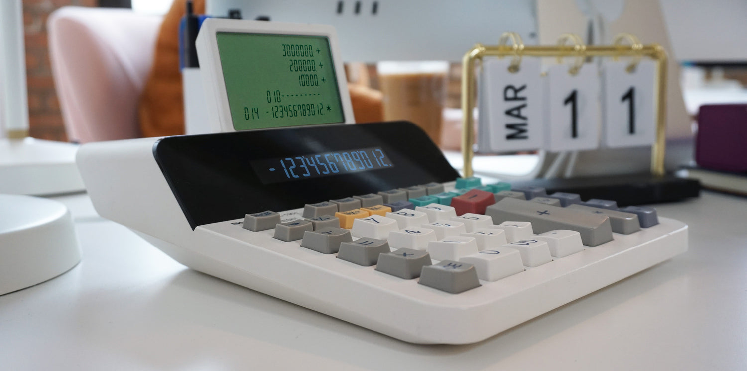 digital display printing calculator on office desk